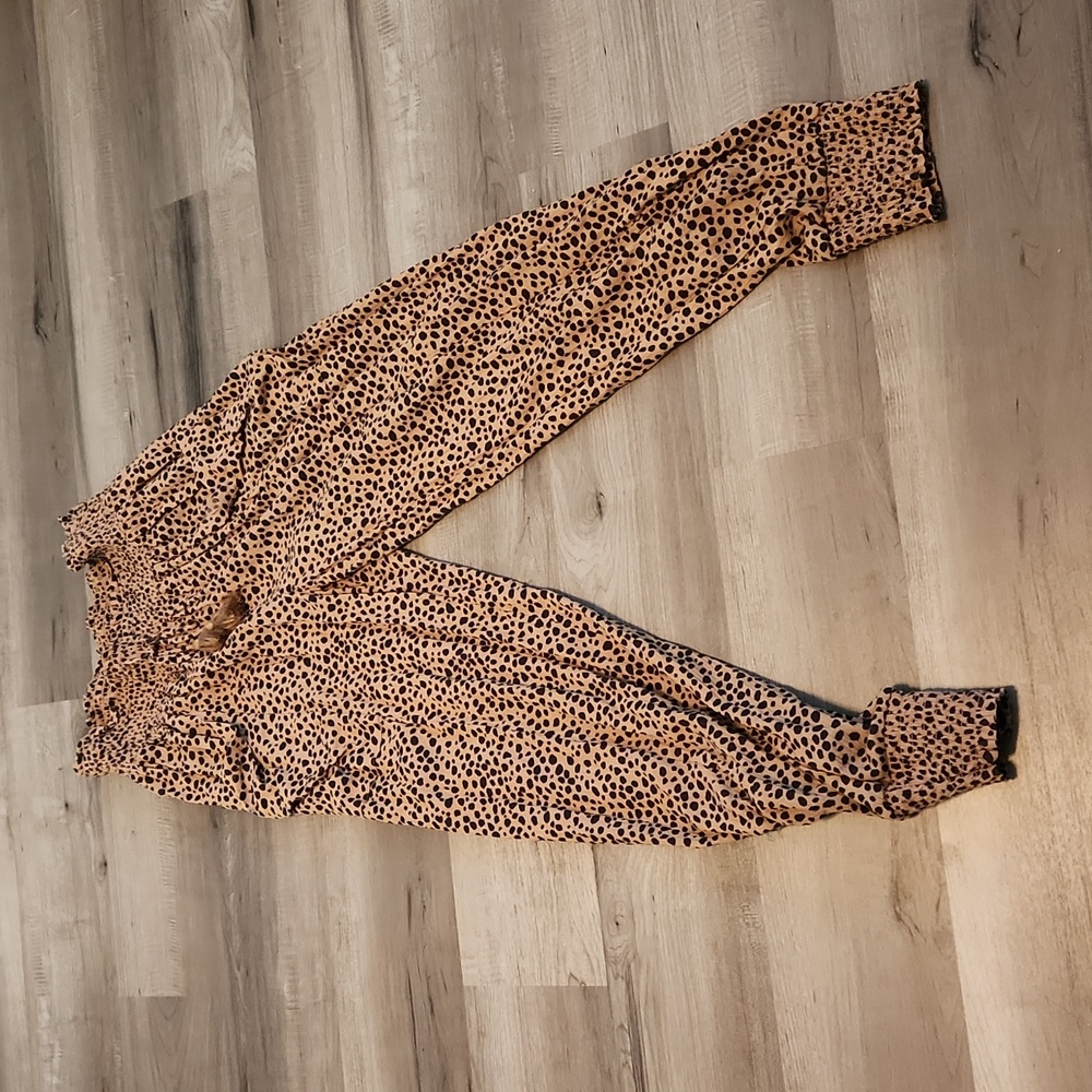 Tan and black jogger pants